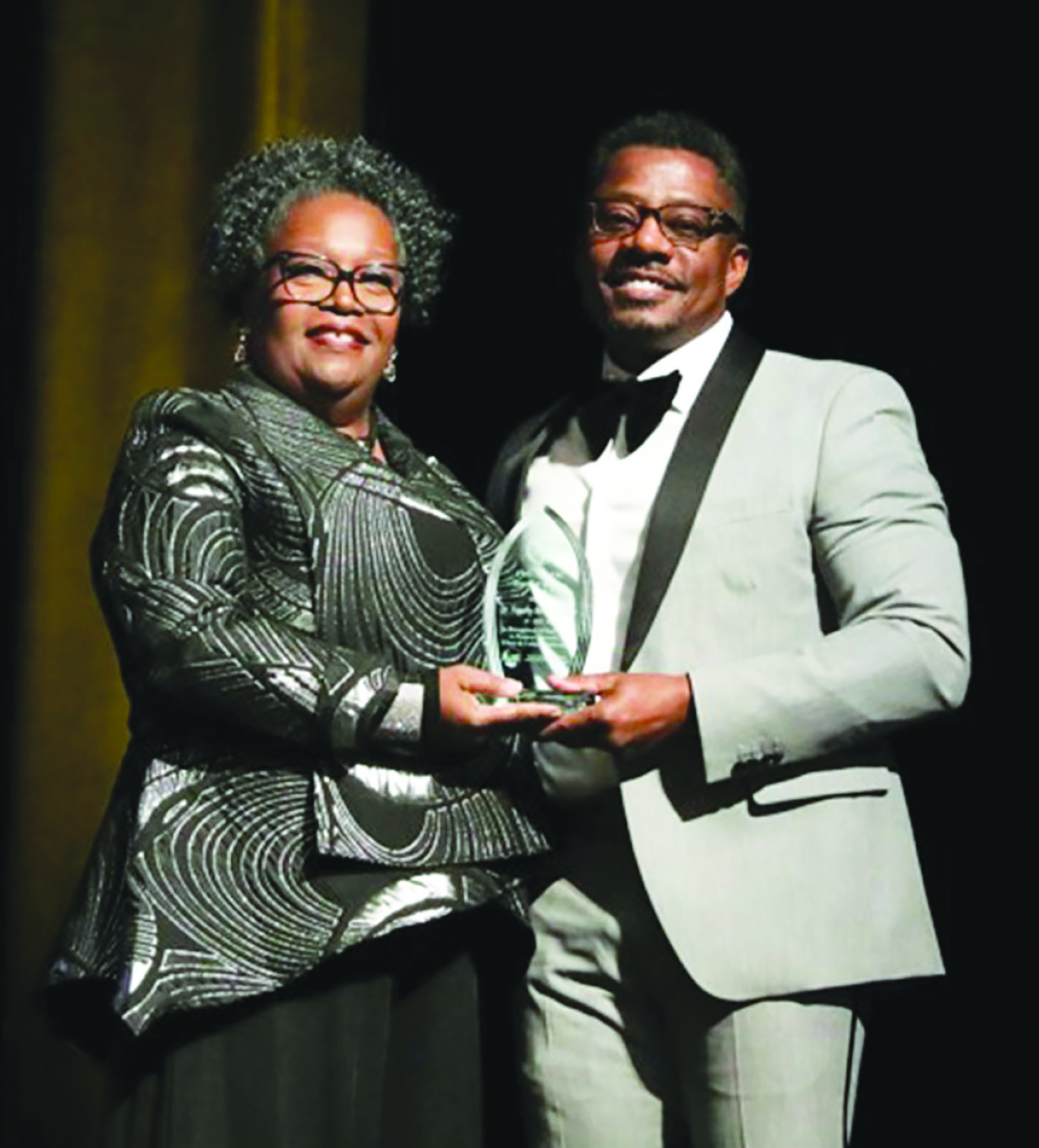 Dr. Michele Norman presents Dr. Tim Hunter with the Together We Can ...