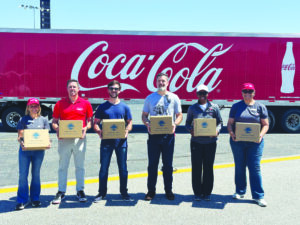 Raceway, Coca-Cola, Harvest Hope and Daniel Suarez prepare Food Boxes ...